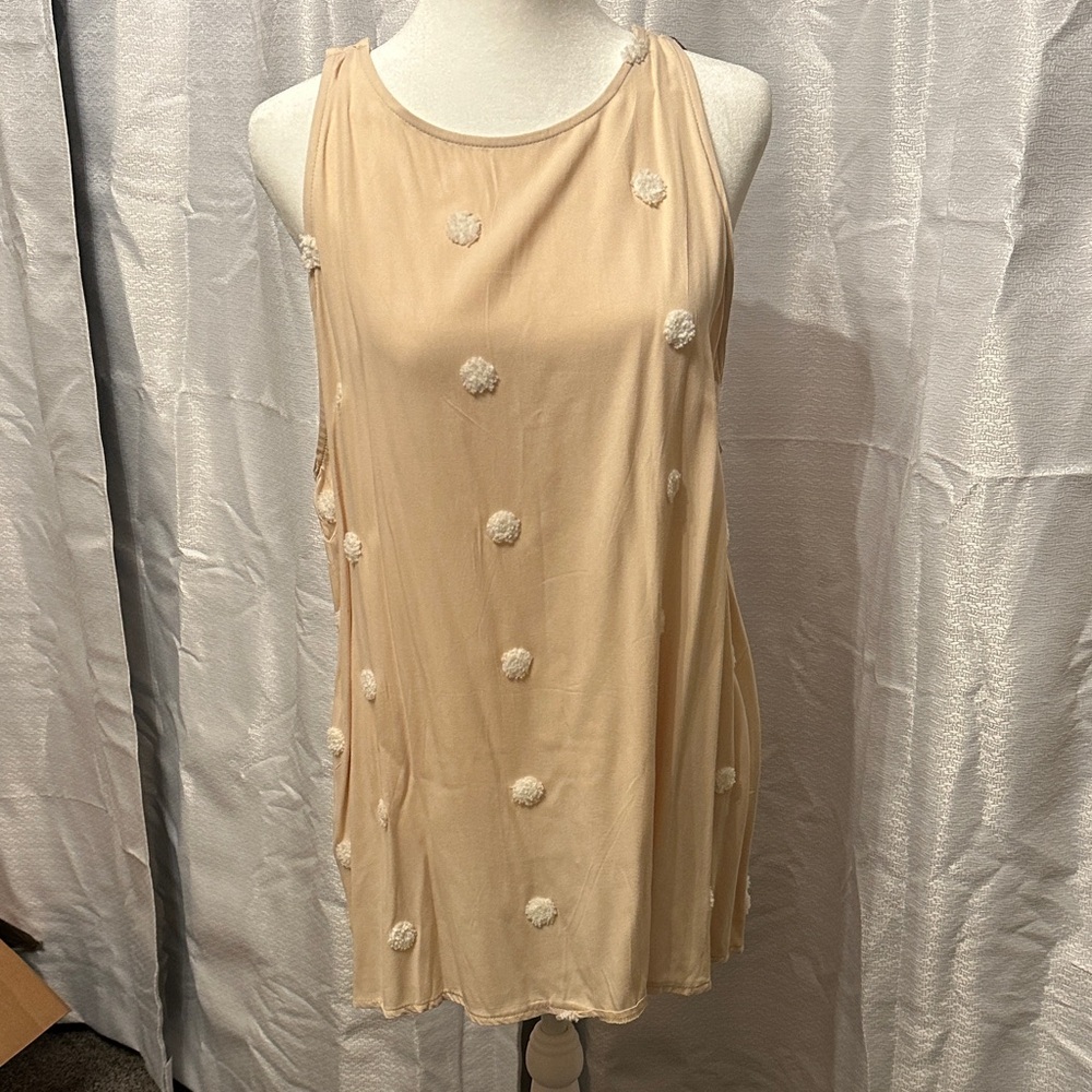 Cream tanktop with Pom Pom Details